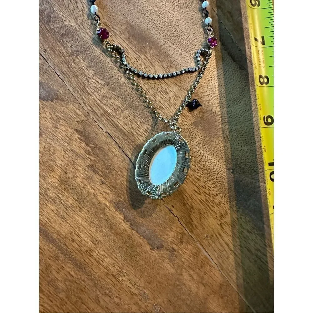 Betsey Johnson, oval zebra print beaded pendant